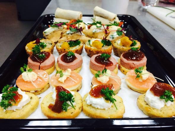 Delicious canapes being served on set by Fayre Do's catering. 