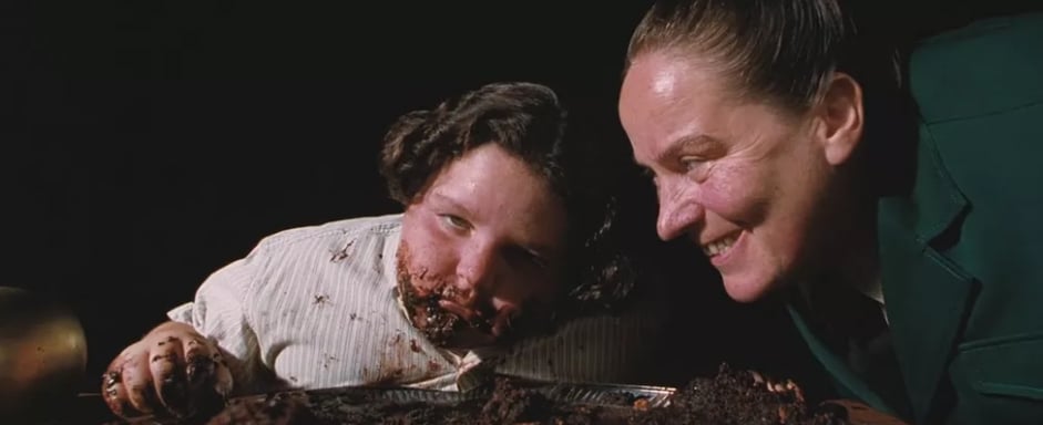 A scene in the film Matilda where Bruce is eating cake 